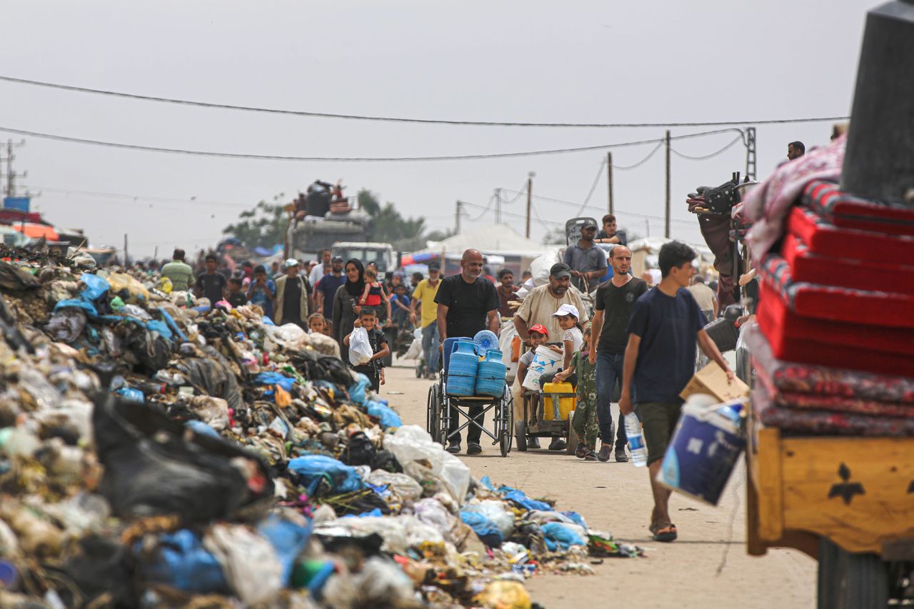 Palestinians packed up their tents and fled to safe areas with what they could take with them following the Israeli army attack on a refugee tent encampment in the al-Mawasi area in Rafah, Gaza on May 28.