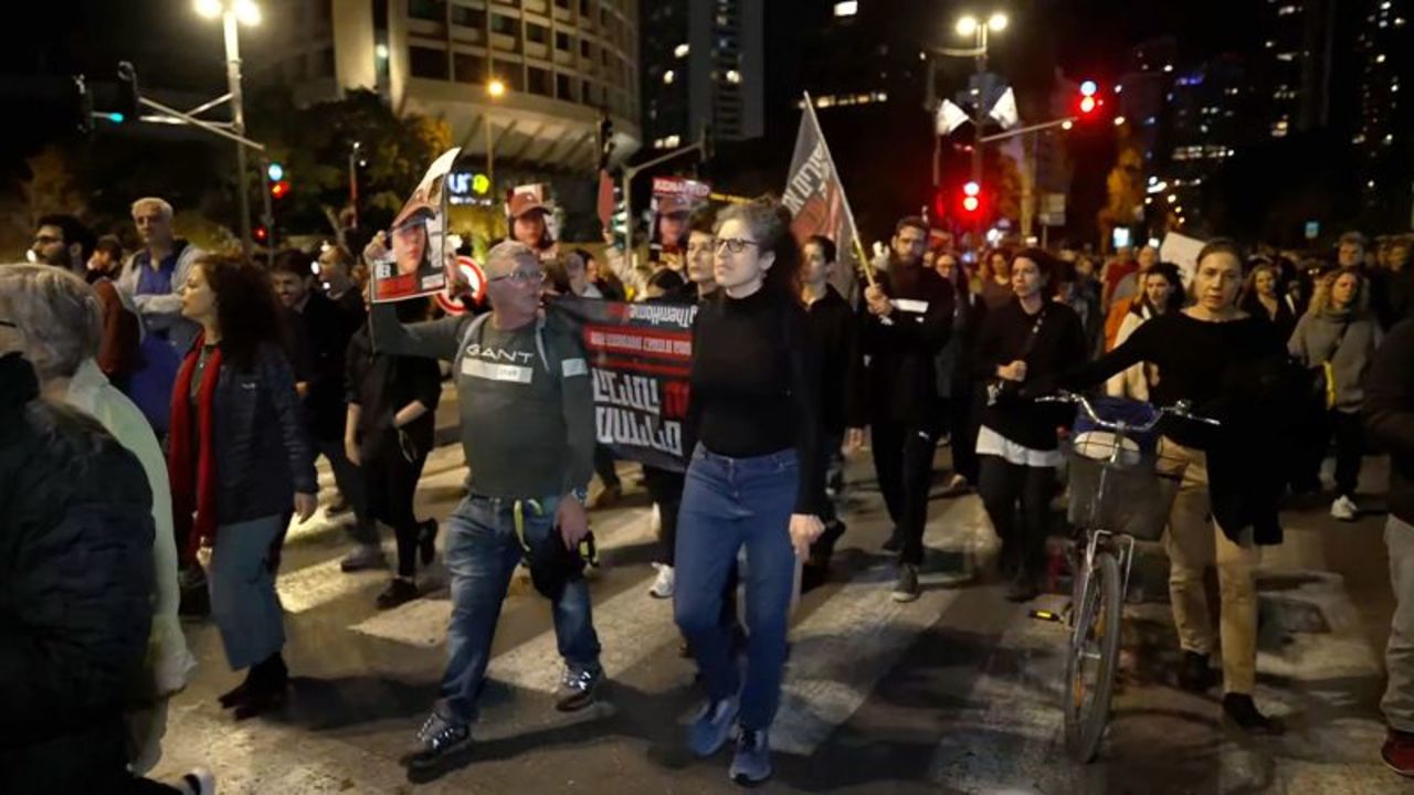 Several dozen people protest in Tel Aviv on Friday, December 15. 