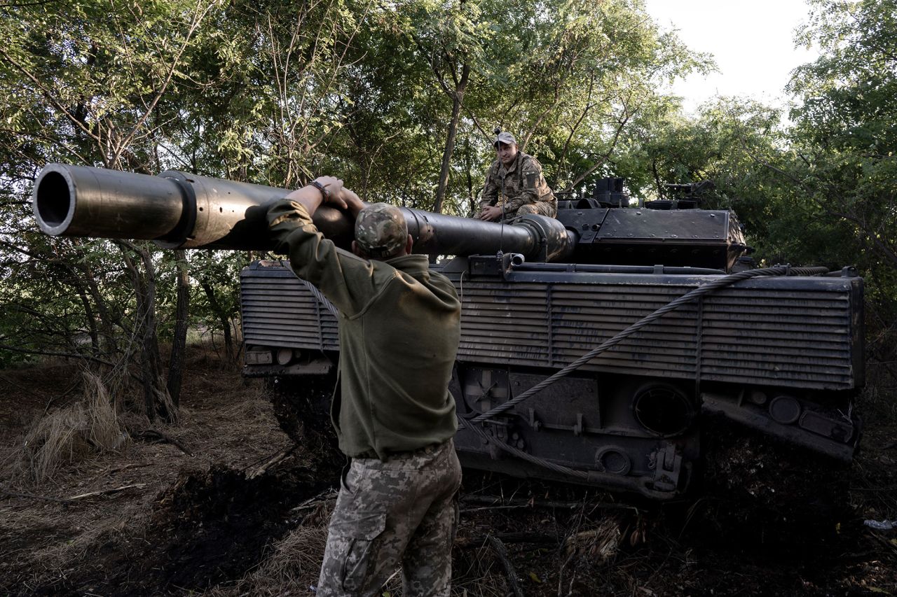 Soldiers of the 47th Brigade of the Ukrainian army are seen with a Leopard 2 at the Tokmak front in Zaporizhia Oblast, Ukraine, on September 16.