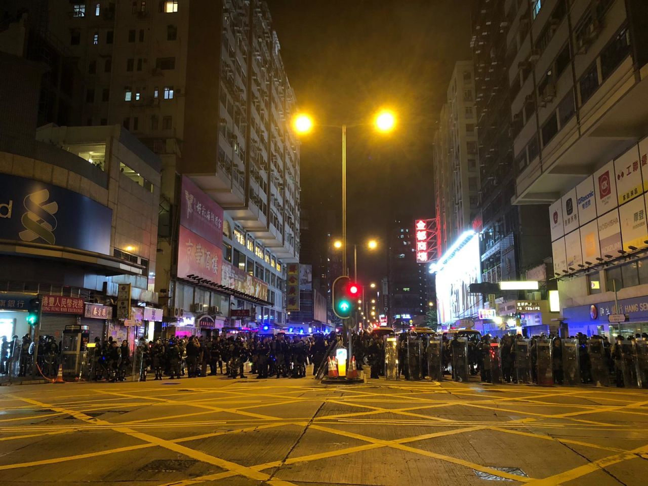 Police on Nathan Road, which has largely been cleared of protesters.