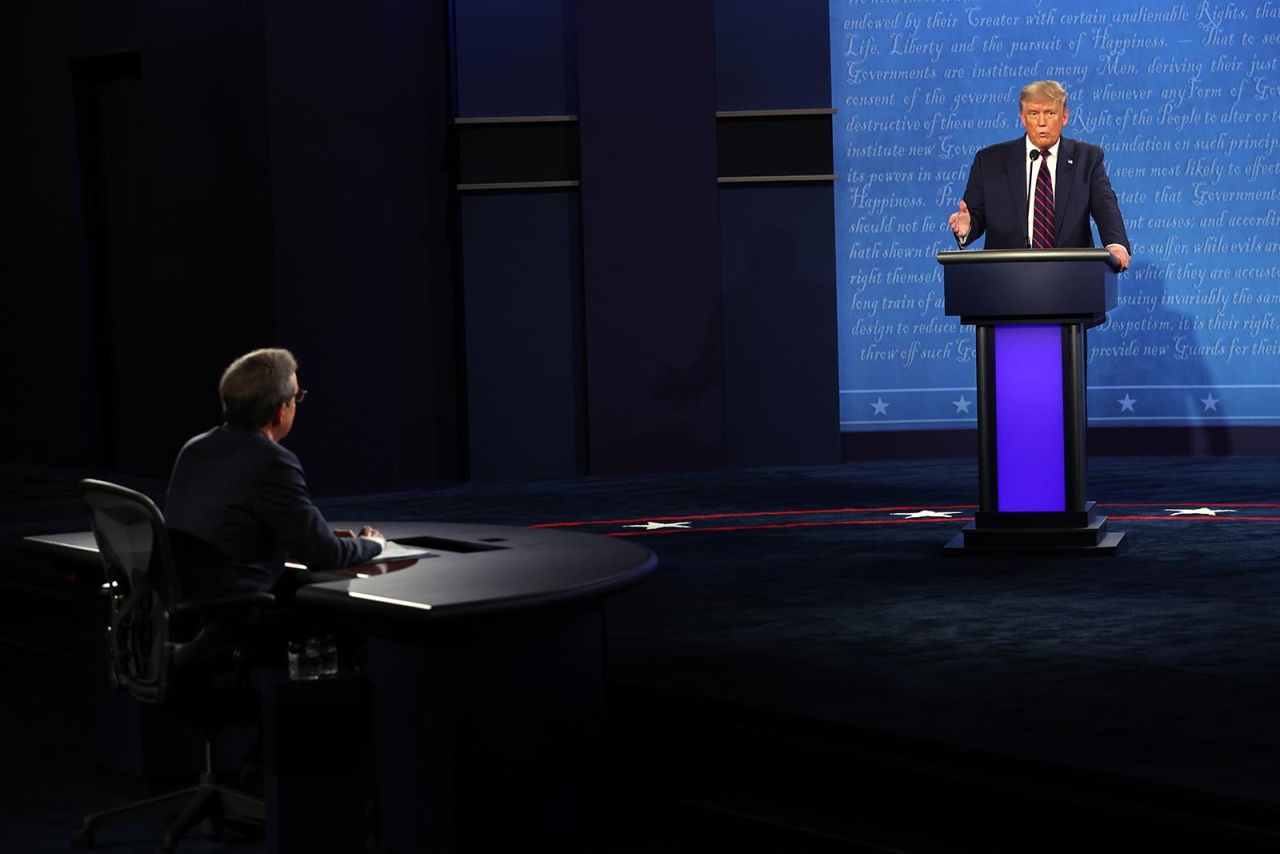 President Donald Trump participates in the first presidential debate against Democratic presidential nominee Joe Biden, moderated by Fox News anchor Chris Wallace at the Health Education Campus of Case Western Reserve University on September 29 in Cleveland, Ohio. 