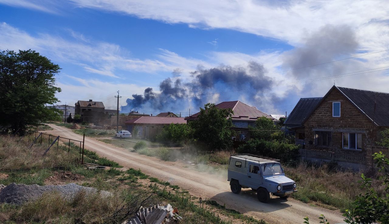 Smoke rises after explosions were heard from the direction of a Russian military airbase near Novofedorivka,?Crimea?on Aug. 9, 2022. 