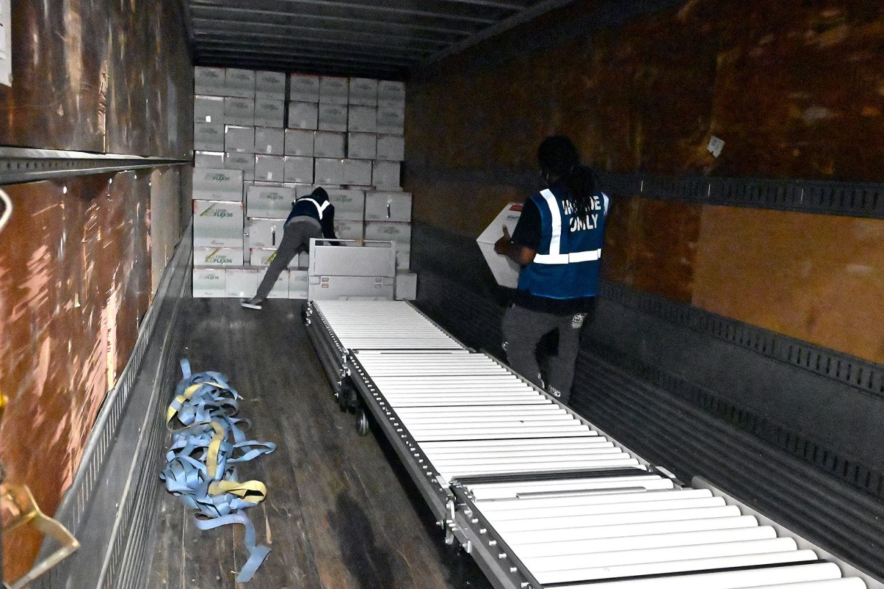 Boxes containing the Johnson & Johnson vaccine are loaded into a truck in Shepherdsville, Kentucky, on March 1.