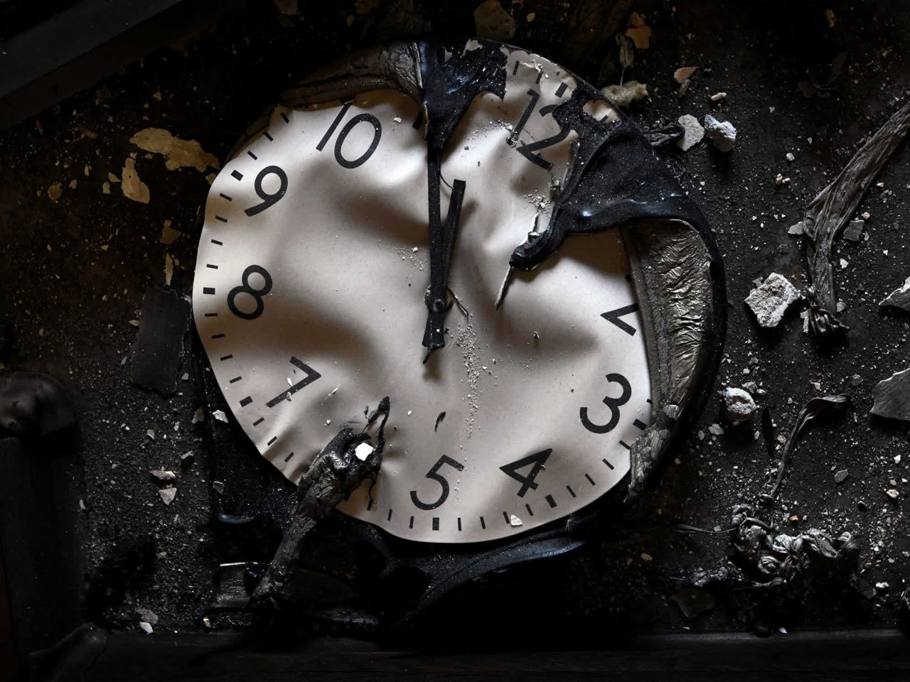 A burned-out clock remains after an attack in Kharkiv, Ukraine.