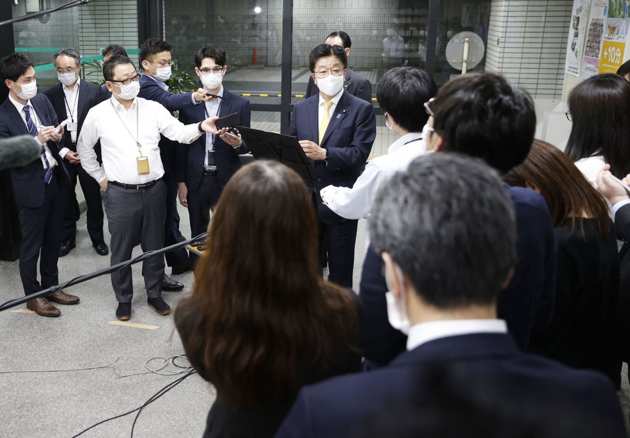 Japanese health minister Katsunobu Kato speaks to the press in Tokyo on May 7, after the government approved the use of the anti-viral drug Remdesivir for new coronavirus patients. 