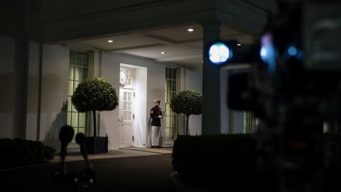 A Marine stands outside the West Wing of the White House on Thursday, September 30.