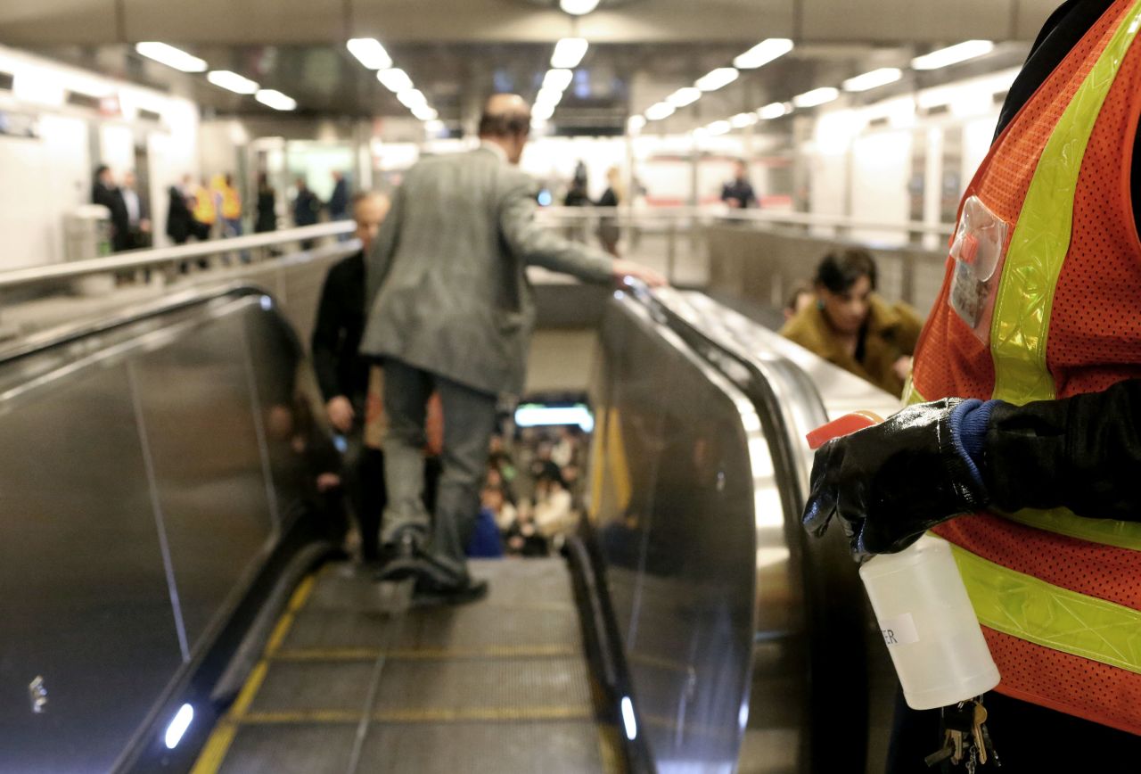 A member of the MTA cleaning staff disinfects the 86th St. Q train station on March 4 in New York City.