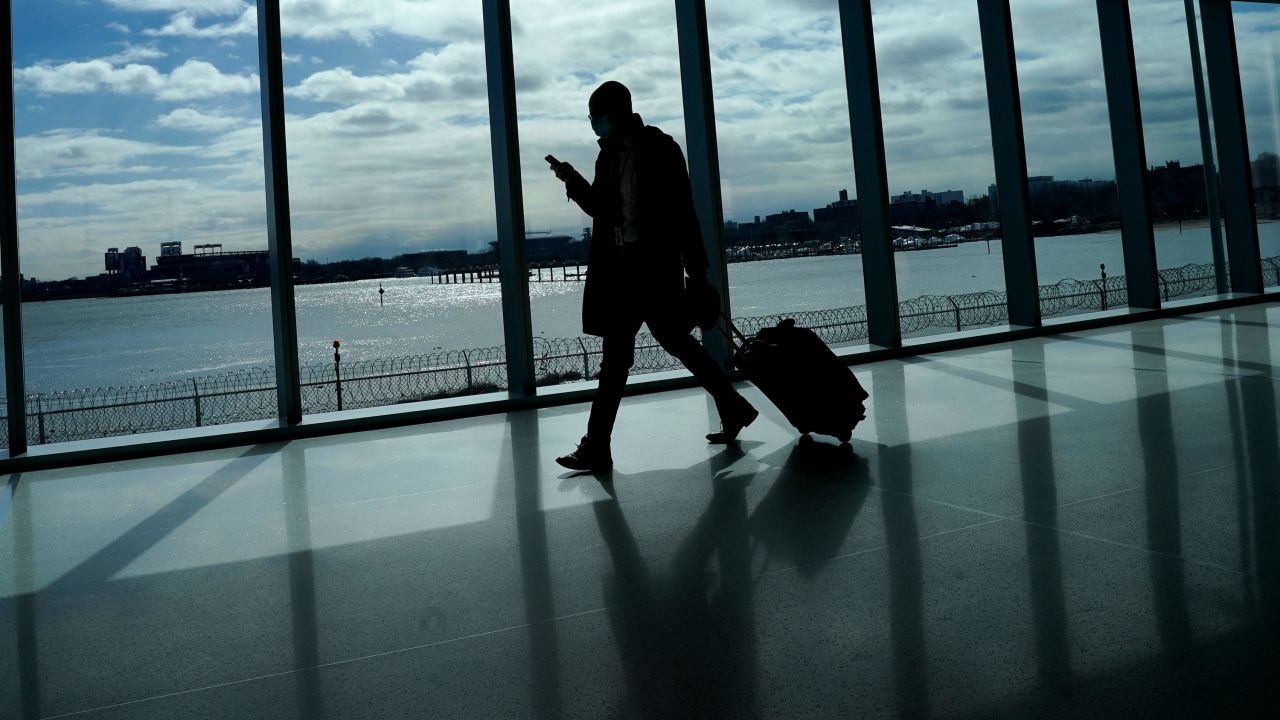 A person walks through LaGuardia Airport in New York, on March 6. 