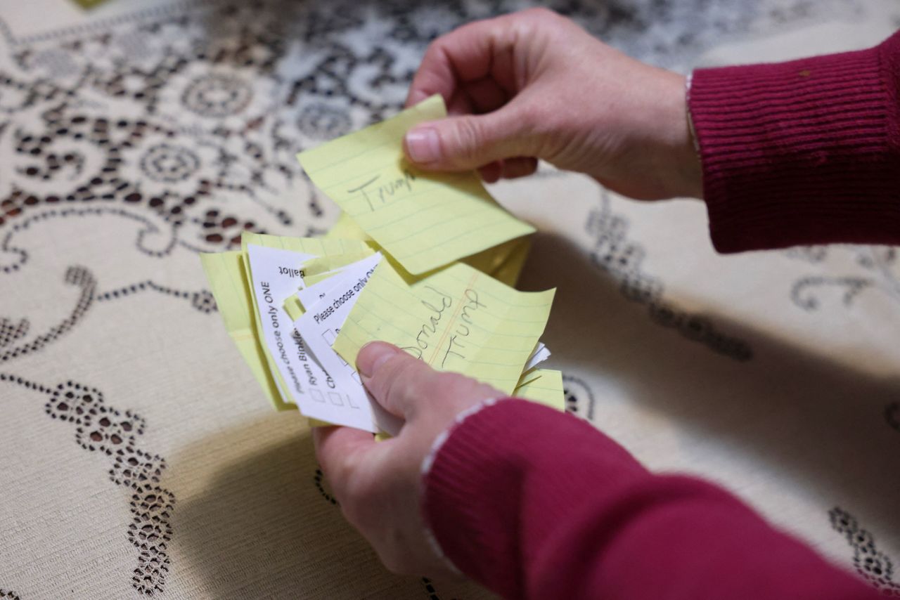 Votes are counted during a caucus to choose a Republican presidential candidate, in Silver City on Monday.