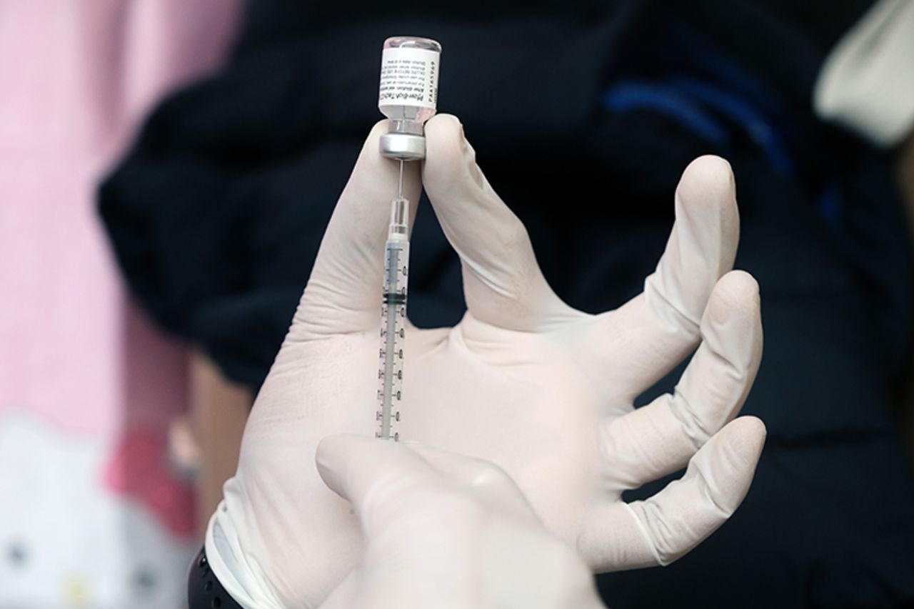 A pharmacist prepares the Pfizer vaccine at a pop-up vaccination clinic on March 26, 2021 in New York City.?