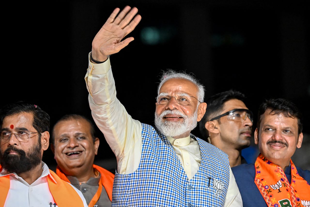 Narendra Modi waves to the crowd during a roadshow in Mumbai on May 15.