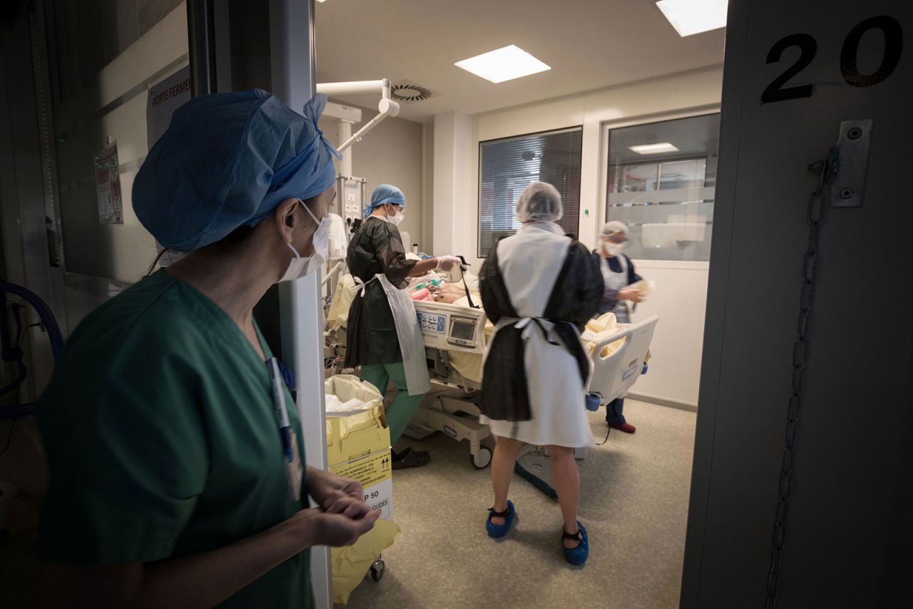 Medical workers tend to a coronavirus patient at Lariboisiere Hospital in Paris, France, on April 27. 