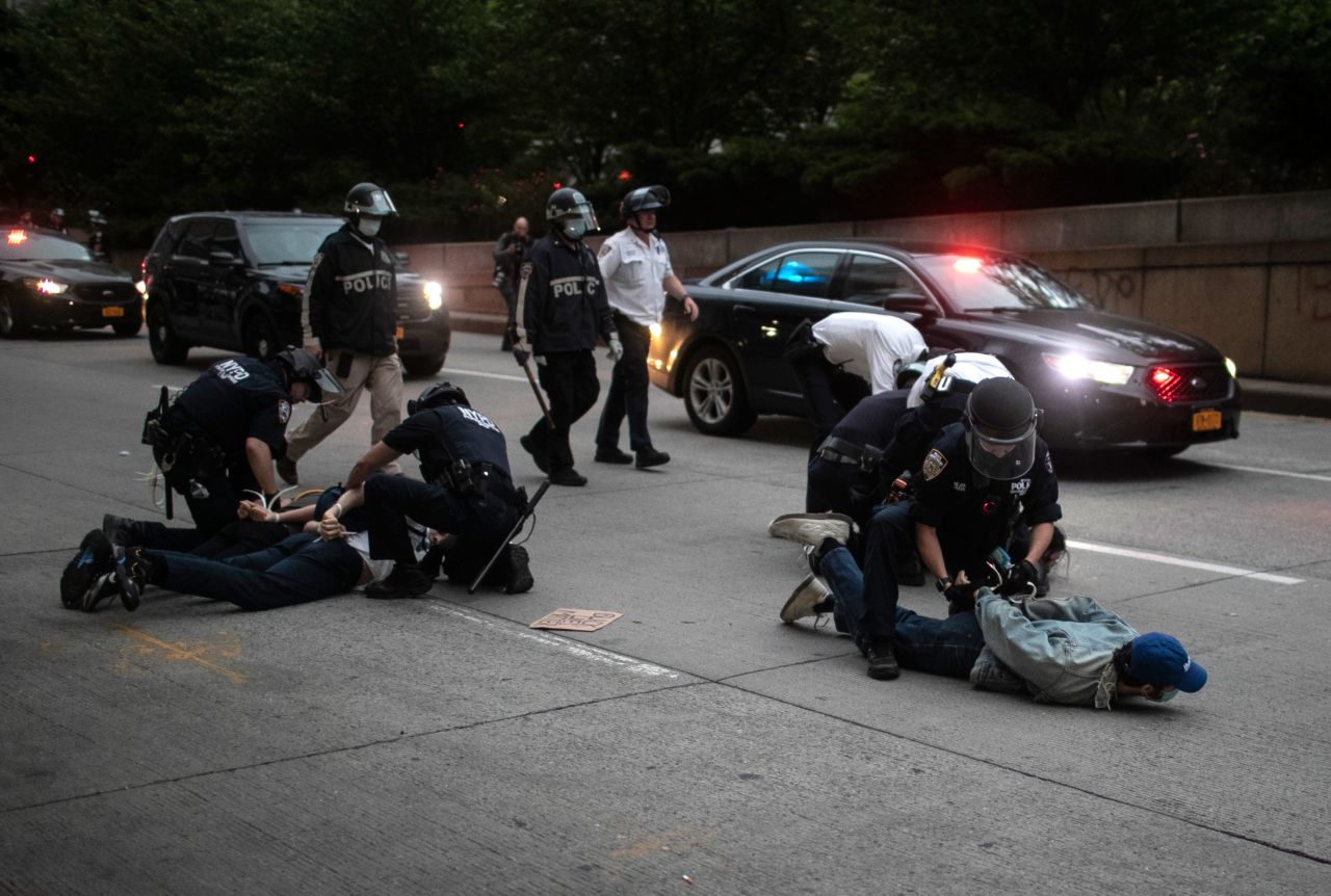 Police arrest protesters after curfew on June 2, in New York. 