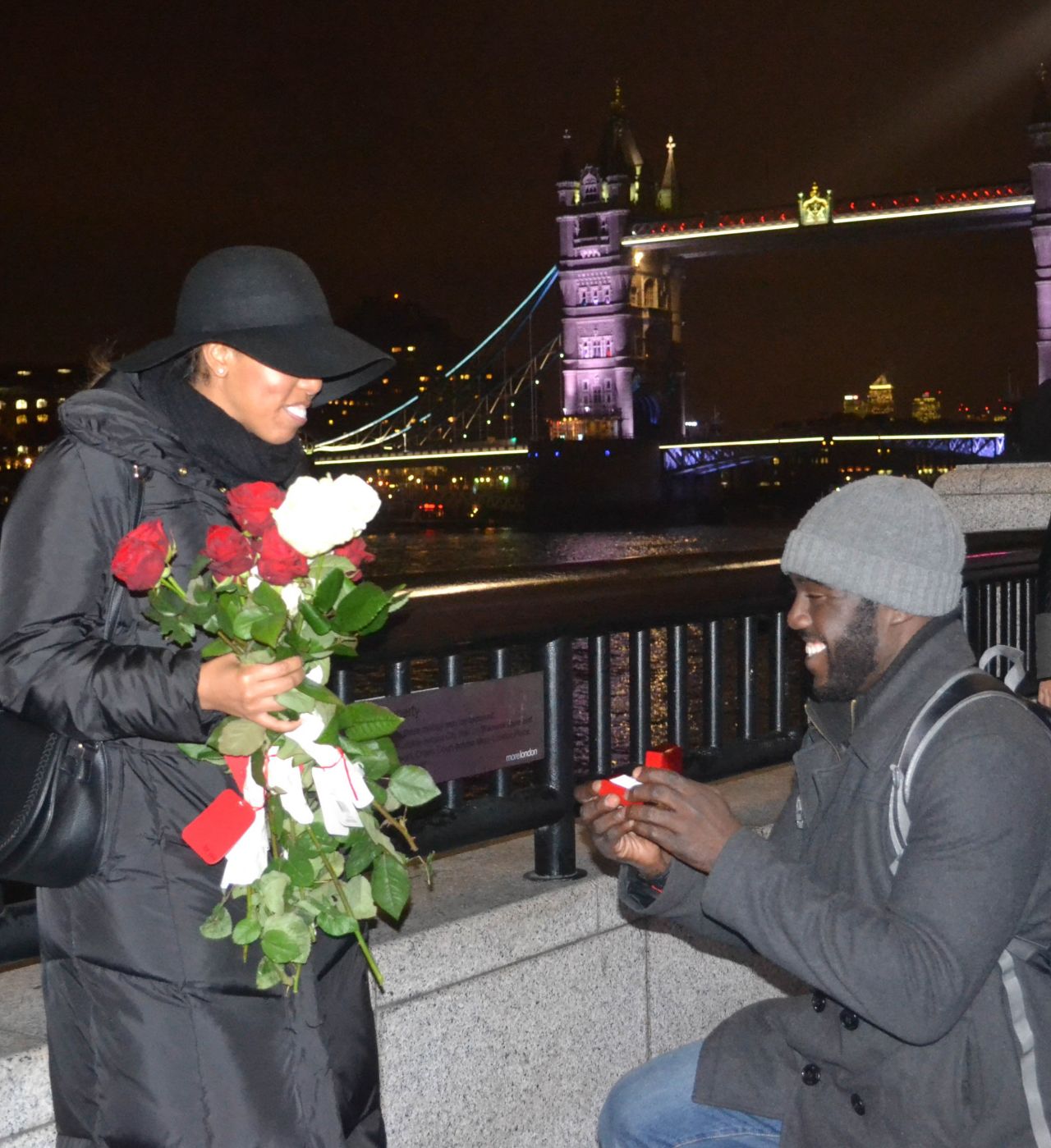Leslie proposed to Martina in London, by Tower Bridge.