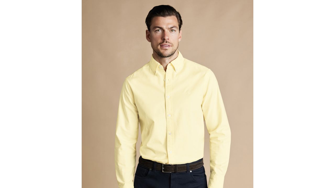 Man wearing Charles Tyrwhitt yellow button-down oxford shirt