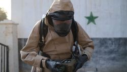 Volunteers from the Syrian Civil Defense, the volunteer organization also known as the White Helmets, inspect the site of a suspected Assad regime chemical laboratory inside a State Security facility in Damascus, Syria.