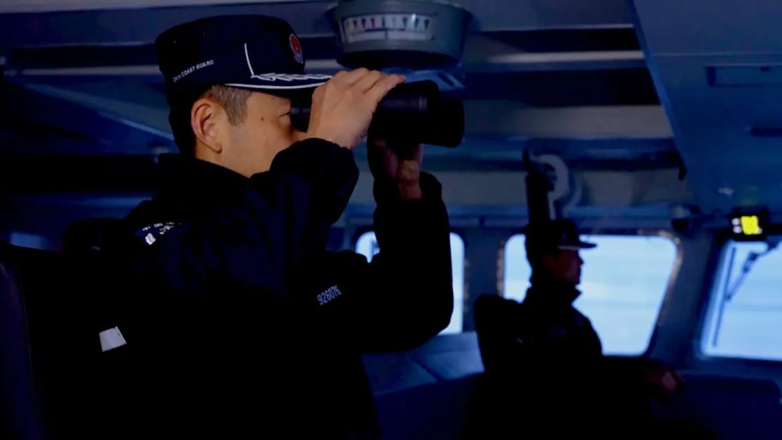 A China Coast Guard member pictured during recent joint drills with Russia.