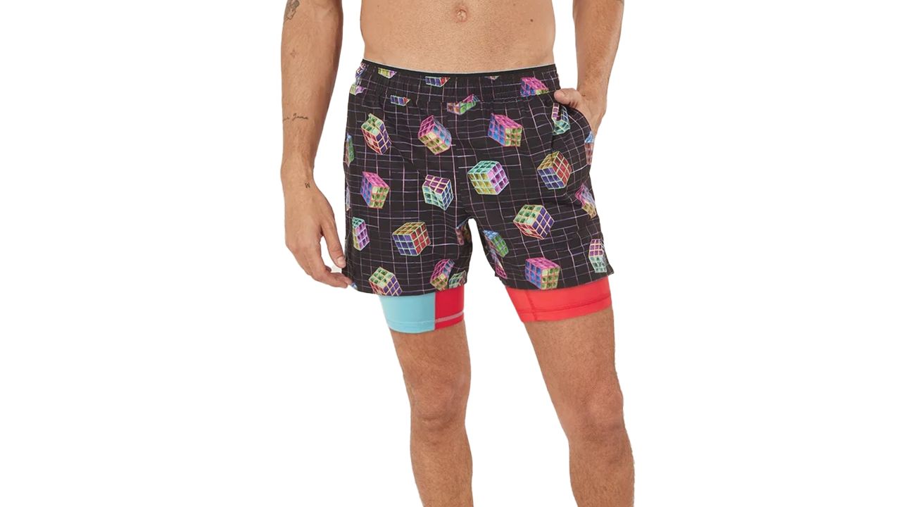 Man wearing Chubbies Ultimate Training Shorts in The Solve Its pattern