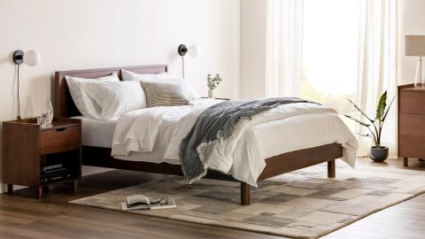 Circa bed with wooden headboard