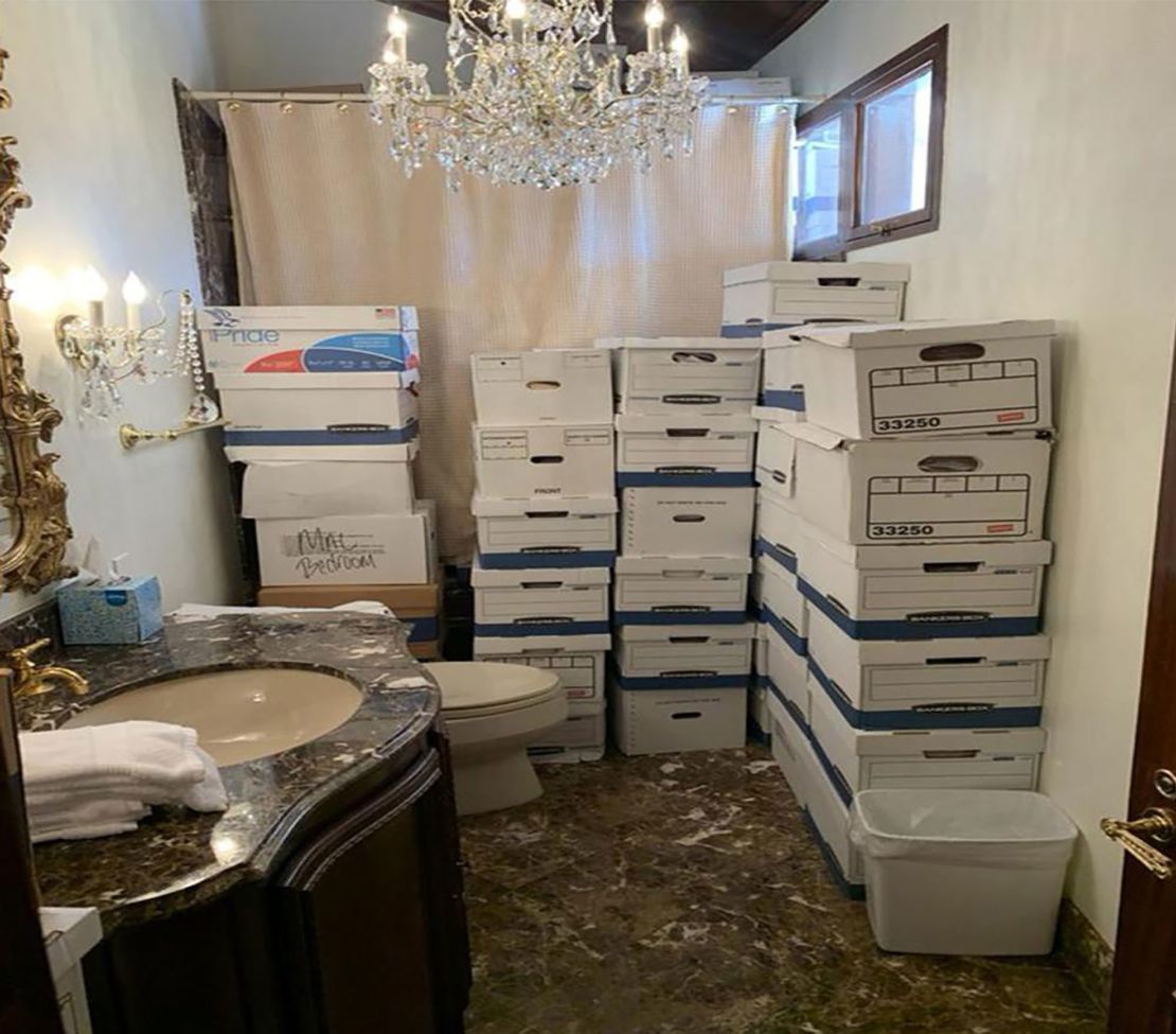 This photo from the US Justice Department shows boxes of classified documents stored in a bathroom and shower in the Mar-a-Lago Club.