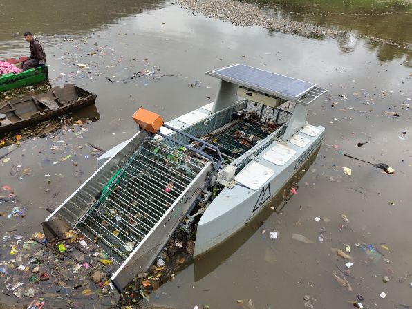 A range of technologies is being used globally to remove plastic and other waste from waterways. Pictured here, Clearbot’s garbage-collecting boat in a lake in northeast India. <strong>Scroll through the gallery to see how tech is helping to clean rivers, lakes, and oceans.</strong>