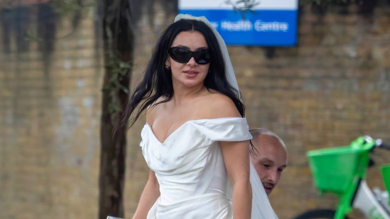 20 July 2025 - EXCLUSIVE.

**UK ONLINE AND PAPER - £1500 min fee**
** UK MAGS - £350 per picture usage - double for cover**

Charli XCX's Surprise Wedding Bash! Pop Star Weds in Hackney Before Heading to Dalston Rave-Up

Pop rebel Charli XCX stunned fans as she tied the knot in a low-key ceremony at Hackney Town Hall - before taking the celebrations to a local Italian eatery just around the corner!

The chart-topping singer and her new hubby, George Daniel (of The 1975 fame), kept things chic and cheeky, strolling hand-in-hand to the restaurant they'd hired out for close pals and family. The whole do was themed Italian - a cheeky nod to their upcoming second wedding blowout set to take place in Italy later this summer.

After wining and dining until around 10pm, the newlyweds snuck off to change before making a grand entrance at Ellies on Kingsland Road, Dalston at around 11pm - where the real party kicked off!

Guests were spotted piling into the late-night hotspot, with the bash reportedly going on into the early hours.

A source said: "It was classic Charli - stylish, fun, and totally unexpected. Everyone was in the mood to celebrate! "


Credit: CLICK NEWS AND MEDIA   Ref: AMdef
**Exclusive to CLICK NEWS AND MEDIA**
CLICK NEWS AND MEDIA - PICTURES@CLICKNEWSANDMEDIA.COM - 07774 321240 -