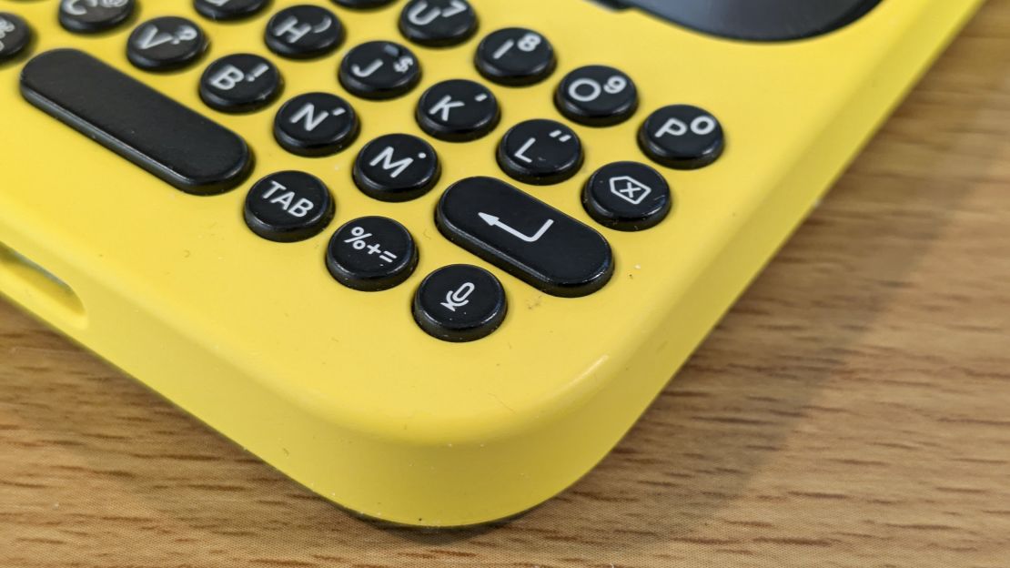 Close up of the buttons on the yellow Clicks keyboard case.