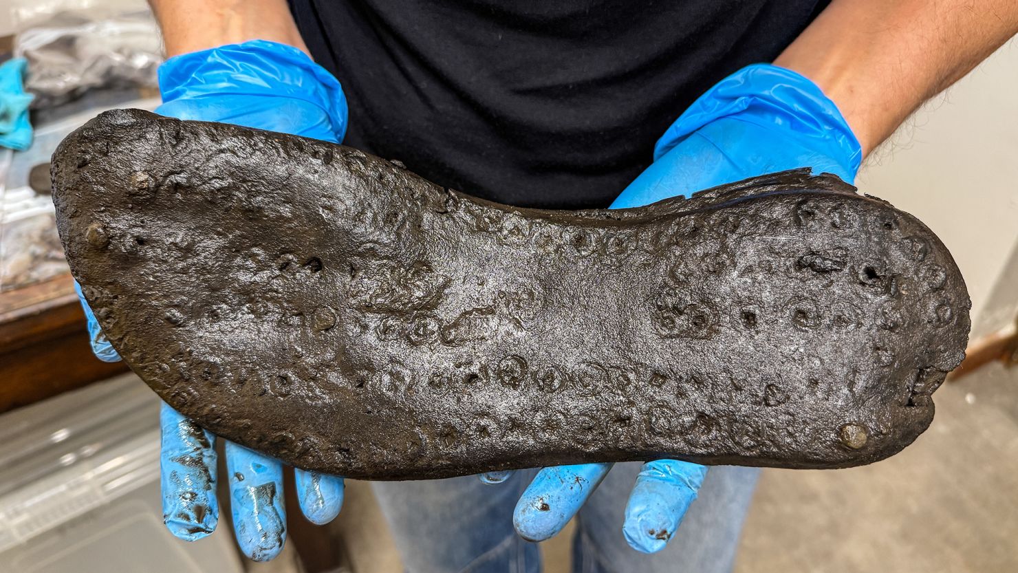 The largest leather sole found at the Magna Fort spans about 12.8 inches (32.6 cm) in length.