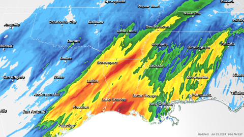 Rainfall totals are shown from Tuesday through Wednesday. Reds indicate higher totals.