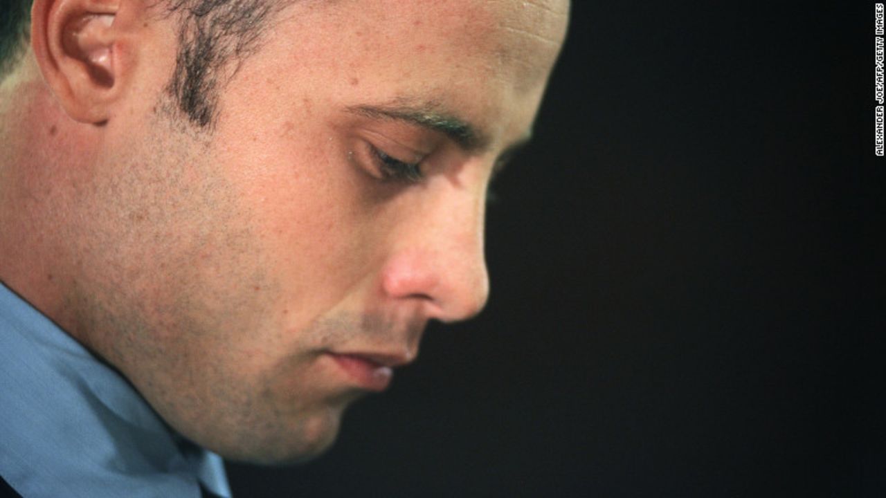 South African Olympic sprinter Oscar Pistorius appears at the Magistrate Court in Pretoria on February 22, 2013. Pistorius battled to secure bail as he appeared on charges of murdering his model girlfriend Reeva Steenkamp on February 14, Valentine's Day. South African prosecutors will argue that Pistorius is guilty of premeditated murder in Steenkamp's death, a charge which could carry a life sentence. Pistorius denies the charge, saying that he shot 29-year-old Steenkamp repeatedly through a locked bathroom door in the dead of night by accident, having mistaken her for a burglar. AFP PHOTO / ALEXANDER JOE (Photo credit should read ALEXANDER JOE/AFP/Getty Images)