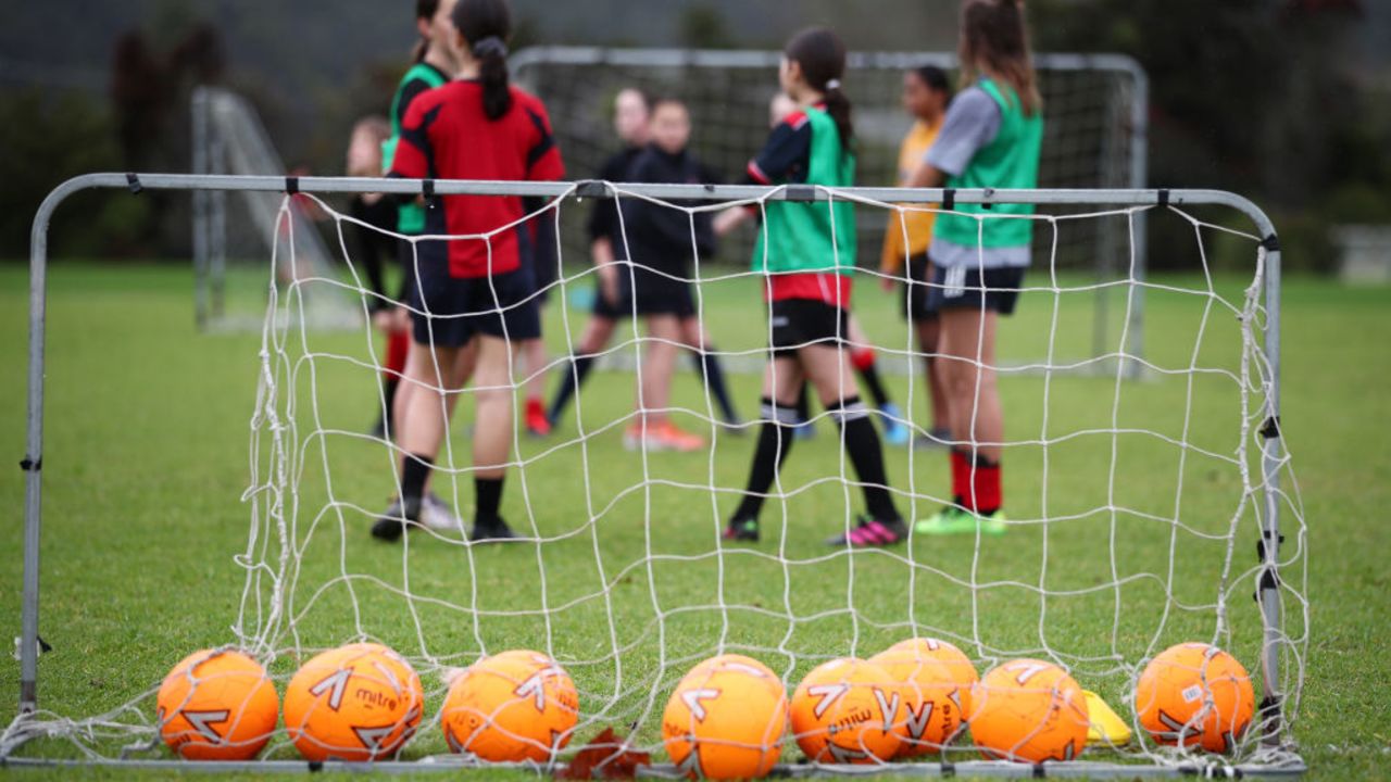 AUCKLAND, NEW ZEALAND - JUNE 18: Training the the rain for the Warkworth Football Club's 13th grade girls Phoenix team at Shoesmith Domain, Warkworth on June 18, 2020 in Auckland, New Zealand. Community sport has resumed across New Zealand following the lifting of COVID-19 restrictions. New Zealand moved to COVID-19 Alert Level 1 on Tuesday 9 June. While life is able to mostly return to normal under Alert Level 1, strict border measures will remain with mandatory 14 day isolation and quarantine for any overseas arrivals.