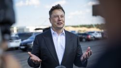 GRUENHEIDE, GERMANY - SEPTEMBER 03: Tesla head Elon Musk talks to the press as he arrives to to have a look at the construction site of the new Tesla Gigafactory near Berlin on September 03, 2020 near Gruenheide, Germany. Musk is currently in Germany where he met with vaccine maker CureVac on Tuesday, with which Tesla has a cooperation to build devices for producing RNA vaccines, as well as German Economy Minister Peter Altmaier yesterday.