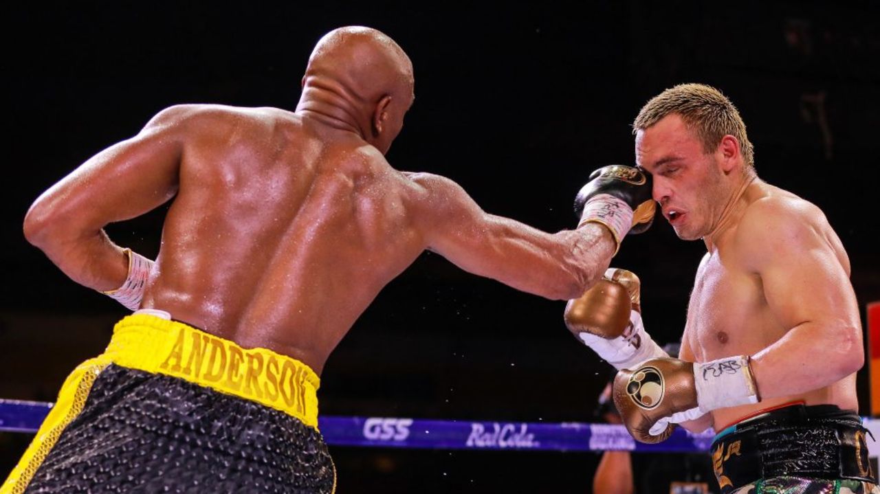 GUADALAJARA, MEXICO - JUNE 19: Anderson "Spider" Silva (L) throws a punch at Julio Cesar Chavez Jr (R) during a fight as part of the Tribute to the Kings at Jalisco Stadium on June 19, 2021 in Guadalajara, Mexico.