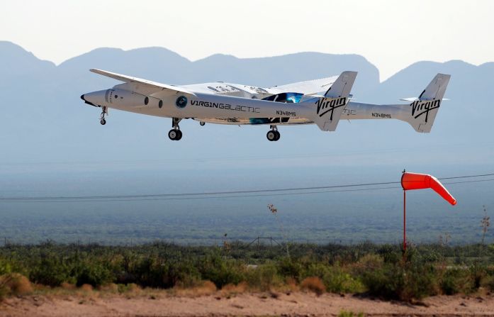 El VSS Unity despega a bordo de su nave nodriza, el avión de transporte de doble fuselaje apodado VMS Eve.