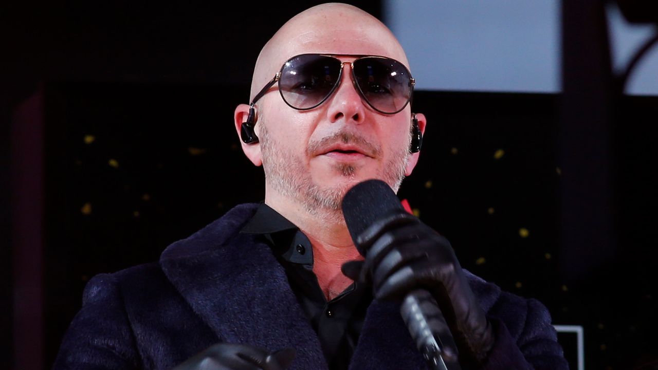 Singer Pitbull performs in Times Square during New Year's Eve celebrations on December 31, 2020 in New York City. (Photo by Gary Hershorn / various sources / AFP)