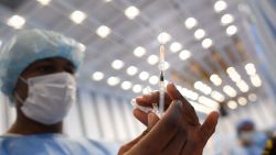 TOPSHOT - A health worker prepares a dose of the Sputnik V vaccine against the Covid-19 during a vaccination day promoted by the municipality and supported by the state government in Caracas, on June 3, 2021. (Photo by Federico PARRA / AFP)