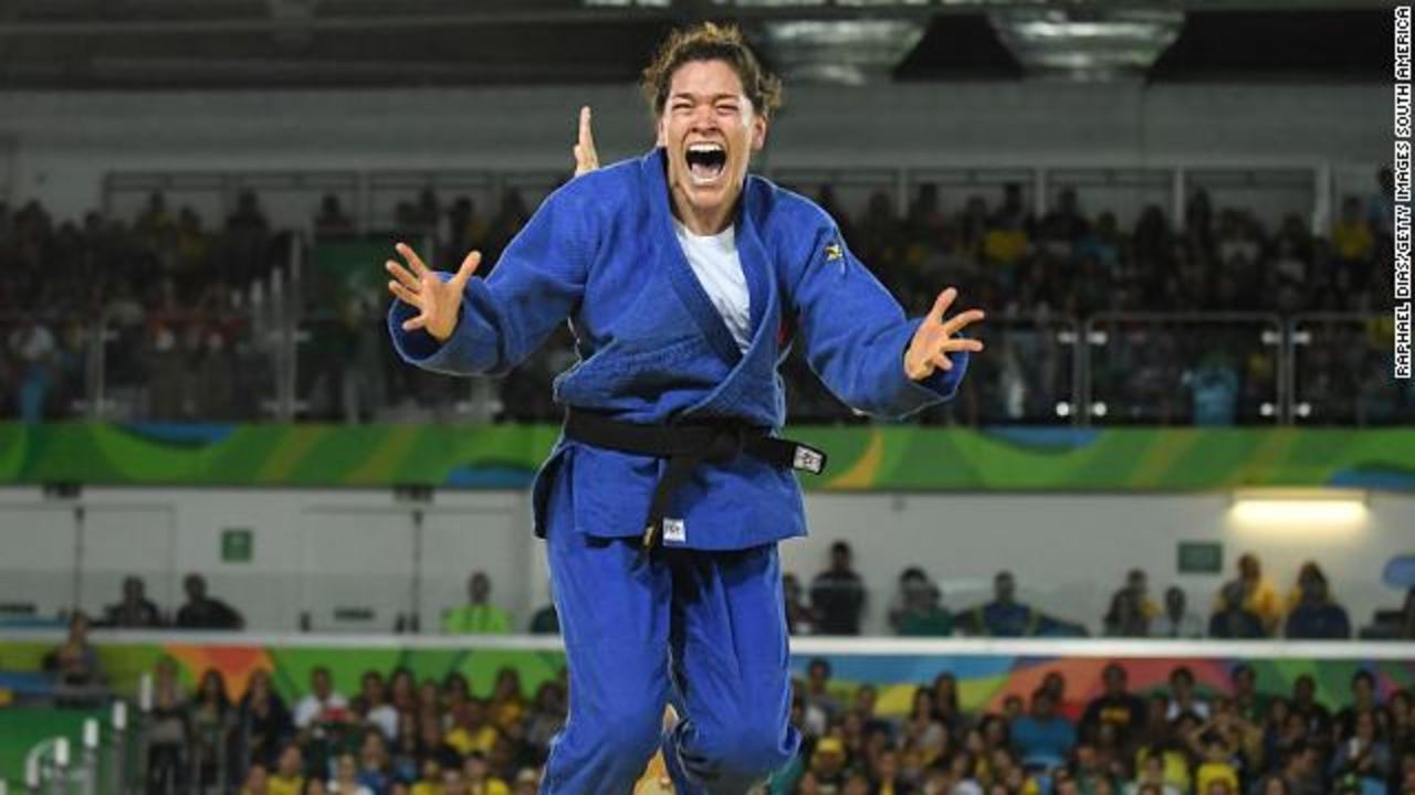 RIO DE JANEIRO, BRAZIL - SEPTEMBER 10: Lenia Fabiola Ruvalcaba Alvarez of Mexico (blue) celebrates her victory over Alana Martins Maldonao of Brazil (white) Women - 70kg Judo Gold Medal bout on Day 3 of the Rio 2016 Paralympic Games on September 10, 2016 in Rio de Janeiro, Brazil.