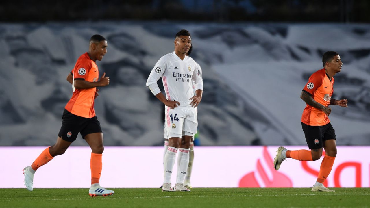 MADRID, SPAIN - OCTOBER 21: Casemiro of Real Madrid reacts as Shakhtar Donetsk players celebrate their side's second goal during the UEFA Champions League Group B stage match between Real Madrid and Shakhtar Donetsk at Estadio Alfredo Di Stefano on October 21, 2020 in Madrid, Spain. The game will be played behind closed doors as a COVID-19 precaution.