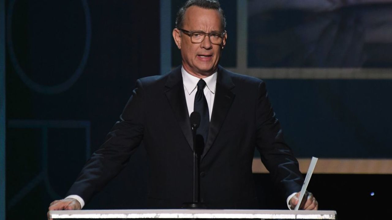 US actor Tom Hanks presents an award during the 26th Annual Screen Actors Guild Awards show at the Shrine Auditorium in Los Angeles on January 19, 2020. (Photo by Robyn Beck / AFP)