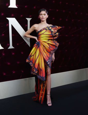 Zendaya a menudo canaliza el espíritu de sus películas a través de sus atuendos, como se ve con el vestido de mariposa Moschino que usó en el estreno de "The Greatest Showman" en 2017. Crédito: Don Arnold / WireImage / Getty Images