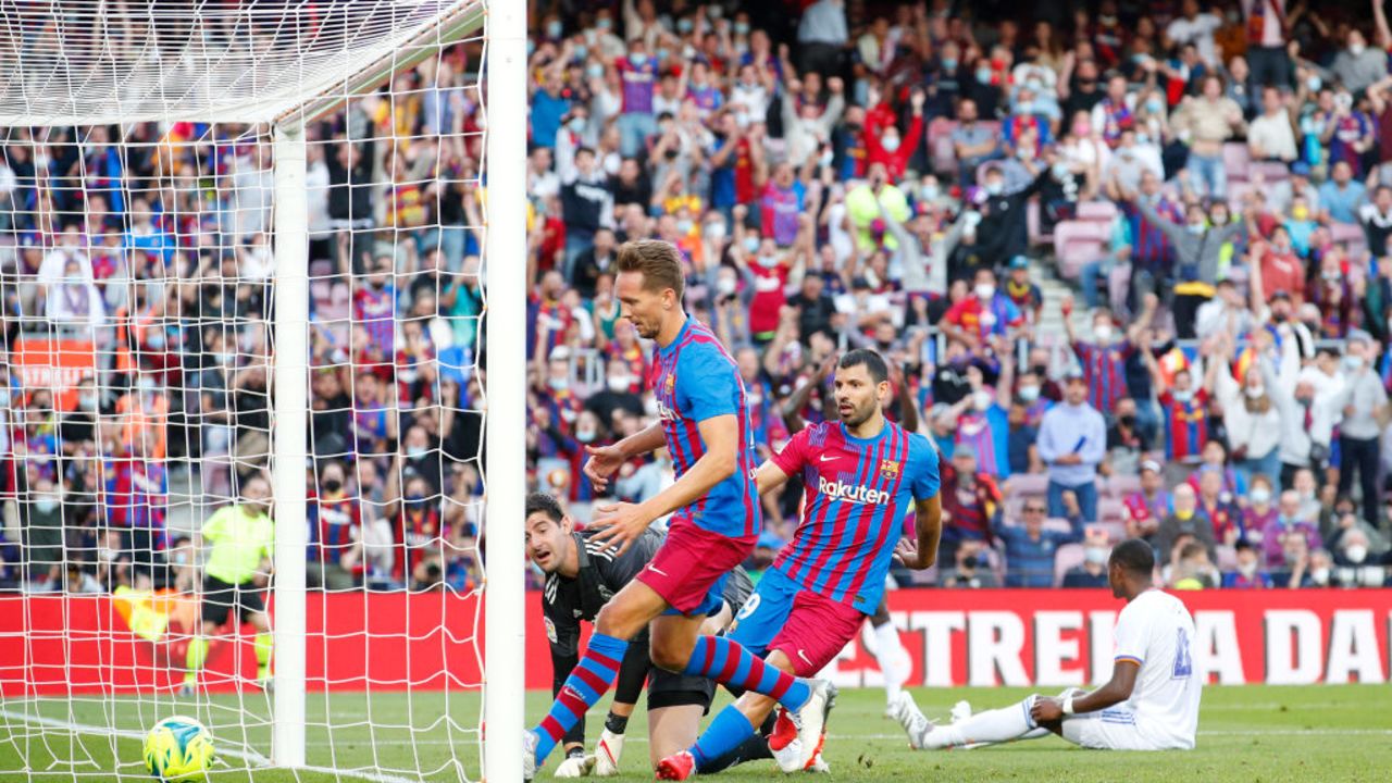 BARCELONA, SPAIN - OCTOBER 24: Sergio Aguero of FC Barcelona scores their side's first goal during the LaLiga Santander match between FC Barcelona and Real Madrid CF at Camp Nou on October 24, 2021 in Barcelona, Spain.