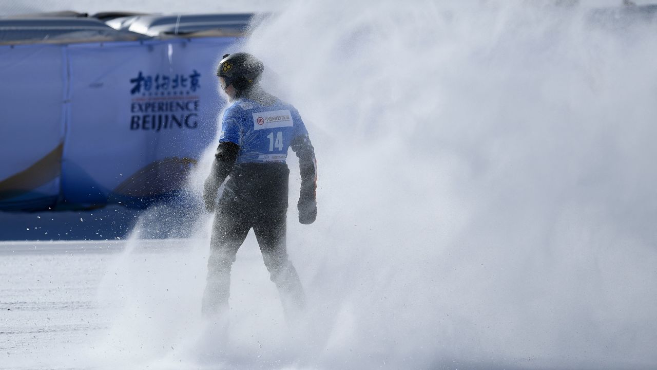 Mick Dierdorff of the US competes in the men's snowboard cross during the FIS Snowboard World Cup 2022, part of a 2022 Beijing Winter Olympic Games test event at the Genting Snow Park in Chongli county, Zhangjiakou city, China's Hebei province on November 26, 2021. (Photo by WANG Zhao / AFP)