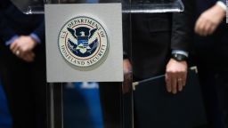 PHILADELPHIA, PA - MARCH 02: The U.S. Department of Homeland Security seal is seen as DHS Secretary Alejandro Mayorkas delivers remarks while visiting a FEMA community vaccination center on March 2, 2021 in Philadelphia, Pennsylvania. Located at the Pennsylvania Convention Center, the site is being run as a partnership between the city and the federal government. It is part of a nearly $4 billion plan for FEMA to  more than 400 community vaccination centers across the country.