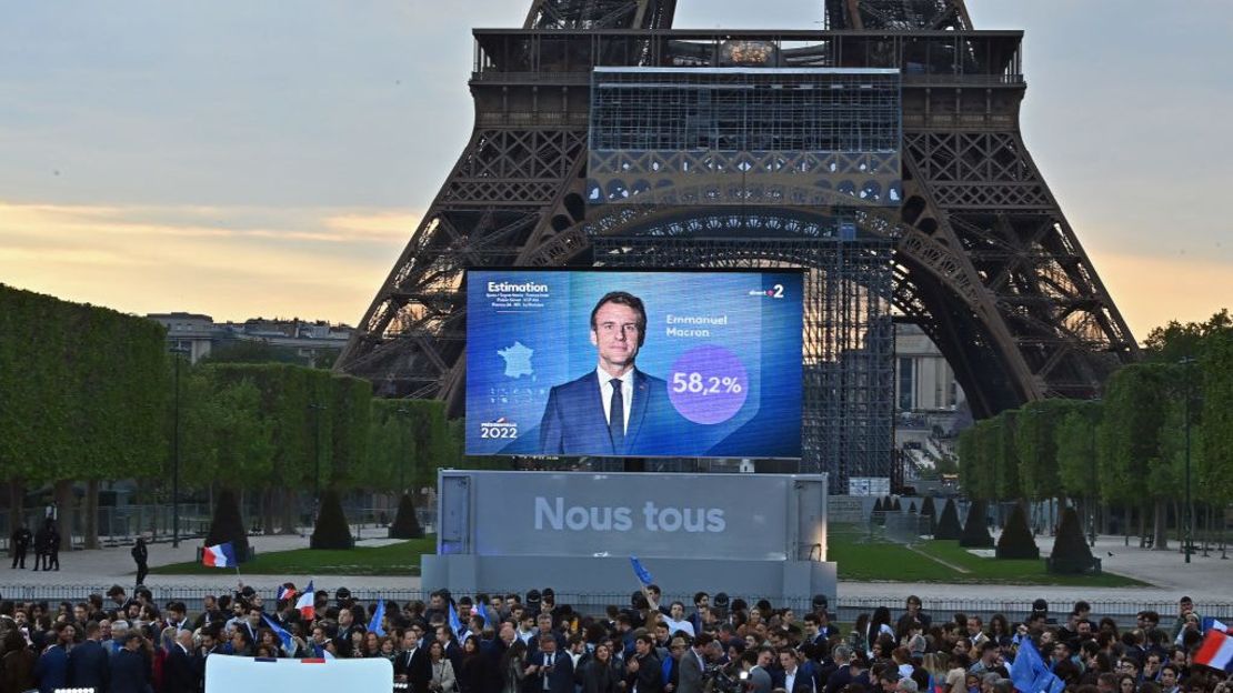 PARIS, FRANCE - APRIL 24: France's centrist incumbent president Emmanuel Macron beats his far-right rival Marine Le Pen for a second five-year term as president with 58,8% votes on April 24, 2022 in Paris, France. Emmanuel Macron and Marine Le Pen both qualified on Sunday April 10th for France's 2022 presidential election second round held today, on April 24. This is the second consecutive time the two candidates face-off in the final round of elections.