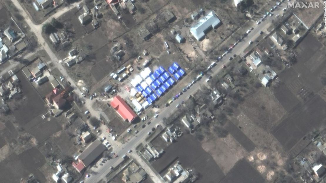 Maxar satellite images show the tent camp in Bezimenne on March 22.