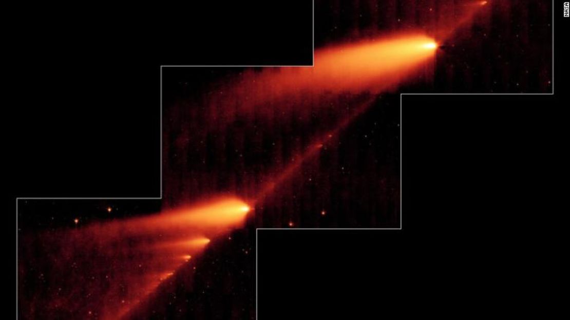 Una imagen infrarroja del telescopio espacial Spitzer de la NASA muestra el cometa roto 73P/Schwassman-Wachmann. Los objetos en forma de llama son los fragmentos del cometa y sus colas, mientras que el rastro polvoriento del cometa es la línea entre los fragmentos.