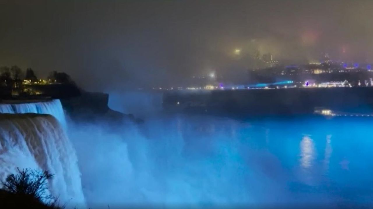 CNNE 1322839 - cataratas del niagara, iluminadas de azul para damar hamlin