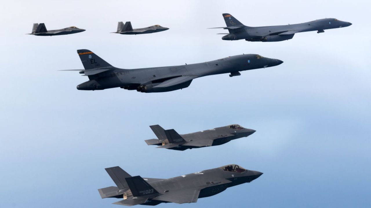 UNDISCLOSED LOCATION, SOUTH KOREA - FEBRUARY 01: In this handout image released by the South Korean Defense Ministry, U.S. Air Force B-1B bombers (C), F-22 fighter jets and South Korean Air Force F-35 fighter jets (bottom) fly over South Korea Peninsula during a joint air drill on February 01, 2023 at an undisclosed location in South Korea. South Korea and the United States staged combined air drills, involving B-1B strategic bombers and F-22 and F-35B stealth fighters from the U.S. Air Force, in a show of Washington's "will and capabilities" against North Korean threats, Seoul's defense ministry said. North Korea said it will take the "toughest reaction" to any U.S. military action in response to the U.S. defense chief's latest pledge to deploy more strategic assets to the Korean Peninsula to ensure its security commitment.
