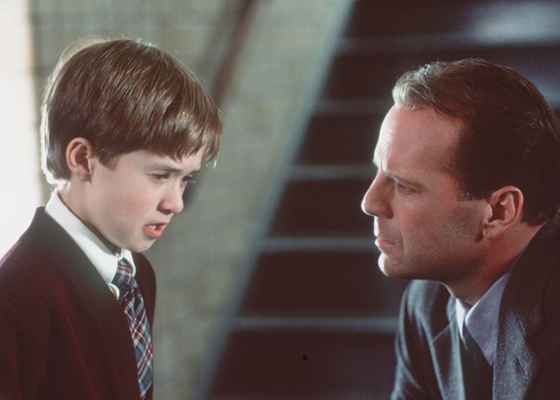 CNNE 1348045 - bruce willis stars as child psychologist dr malcolm crowe and haley joel osment (l) star