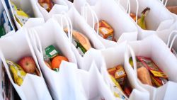 LONDON, UNITED KINGDOM - OCTOBER 26: Food lunch packs for those who are in need of free children’s meals over the half term holiday are seen at the "Planet Youth" holiday and after-school camp in Muswell Hill on October 26, 2020 in north London, United Kingdom. Offering either pre-made parcels or a bag of ingredients to families in need of assistance during the half-term holiday, the company also offers a free day pass to any recipient of the food packs and is appealing for food donations after providing the initial packs from it's own funds. In a House of Commons vote last week, Conservative MPs voted down a bill that would have provided food for children already on the Free School Meals scheme in schools. Hundreds of businesses across the country have offered children in need meals after pleas from the England and Manchester United Footballer Marcus Rashford.